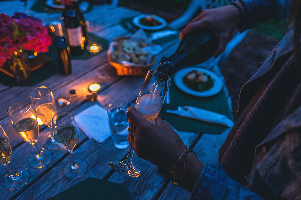 Wine-Outside-Table Pouring Wine Outside on a Table